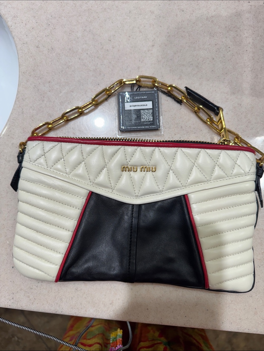 Miu Miu Cream and Black Quilted Leather Wristlet with Gold Chain